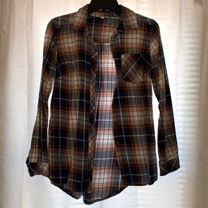 Size small blue and brown plaid flannel with left breast pocket.